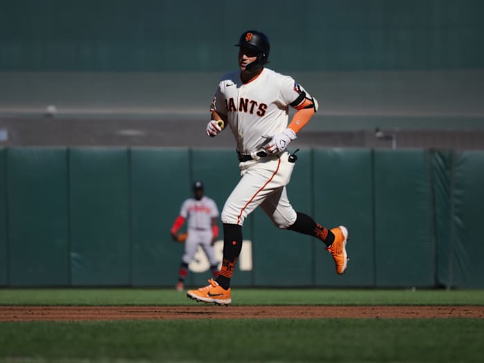 SF Giants third baseman Casey Schmitt rounds the bases on a solo home run against the Atlanta Braves during the second inning at Oracle Park on August 27, 2023.